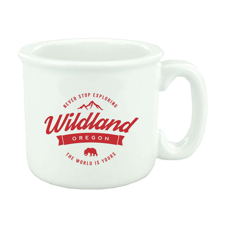 Custom 15 oz Solid-Color Campfire Mug featuring Wildland Oregon design and adventure-inspired text.