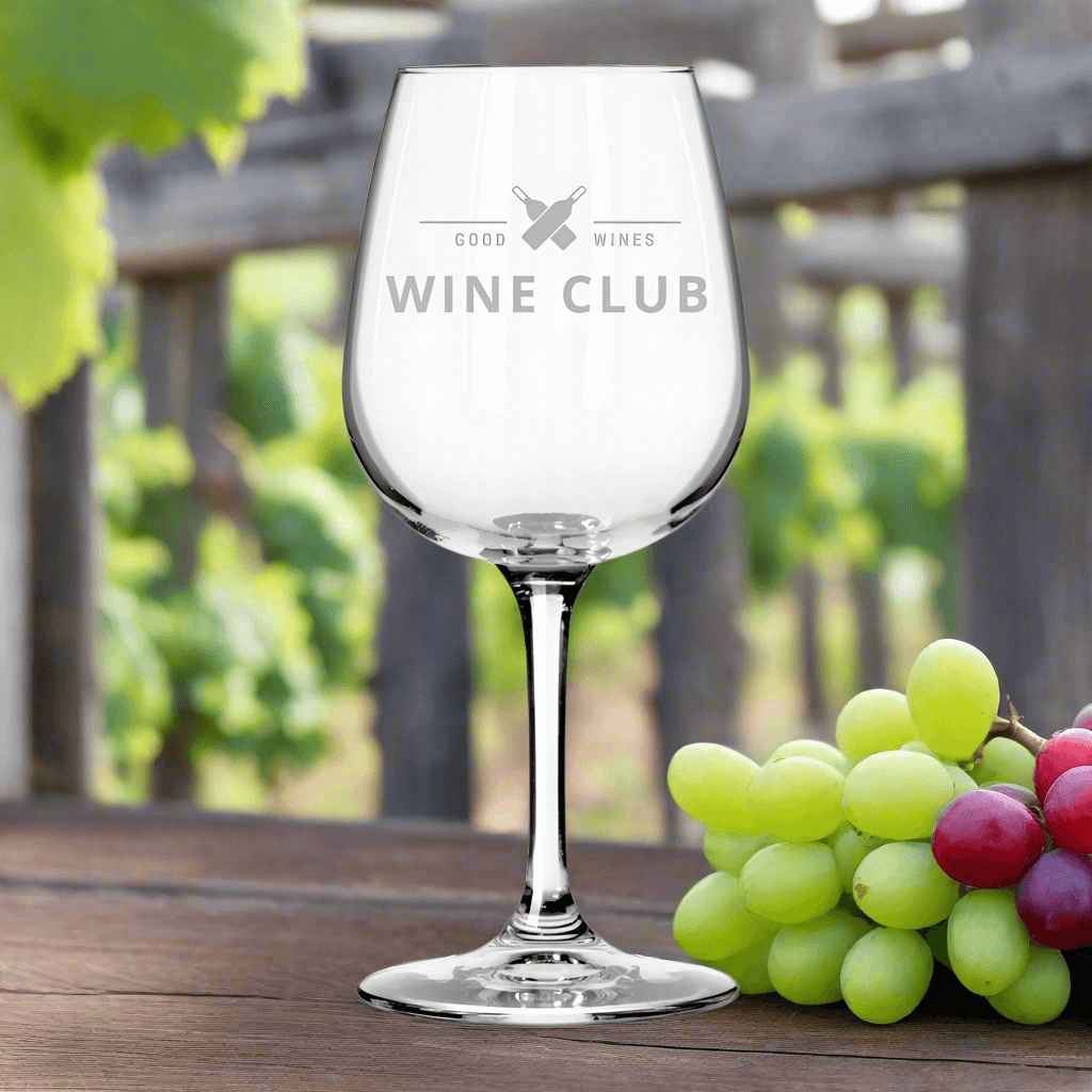 Custom 12.75 oz wine taster glass with 'Wine Club' logo, surrounded by grapes in an outdoor vineyard setting.