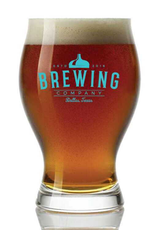 Close‑up of branded section on 16 oz Arc Barlow pilsner glass, showing vivid full‑color logo on clear glass surface