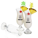 Custom Libbey 14.5 oz Squall Hurricane Glass with cocktails decorated with tropical garnishes.